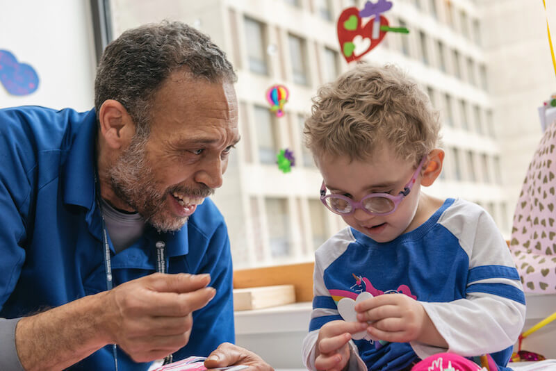 Best in Care nominee, Lucilo Puello, receives a valentine from Ellie