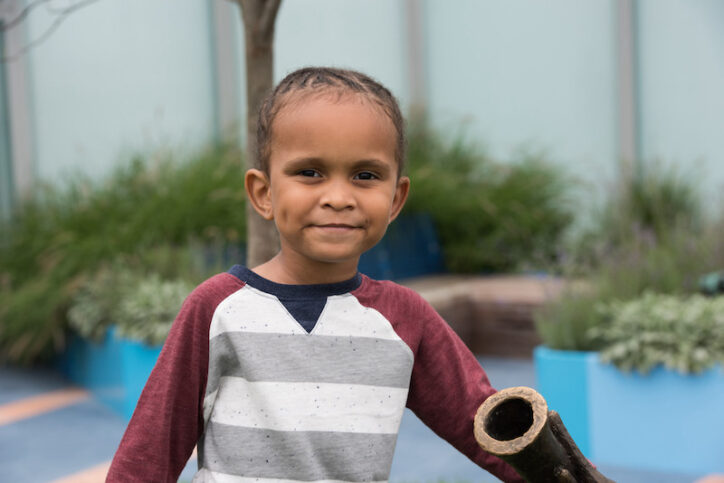 zaire stands on the boston childrens roof garden