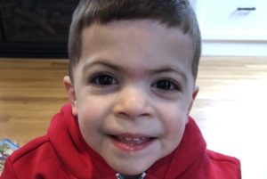 David, who was able to have an MRI without being sedated, smiles for the camera