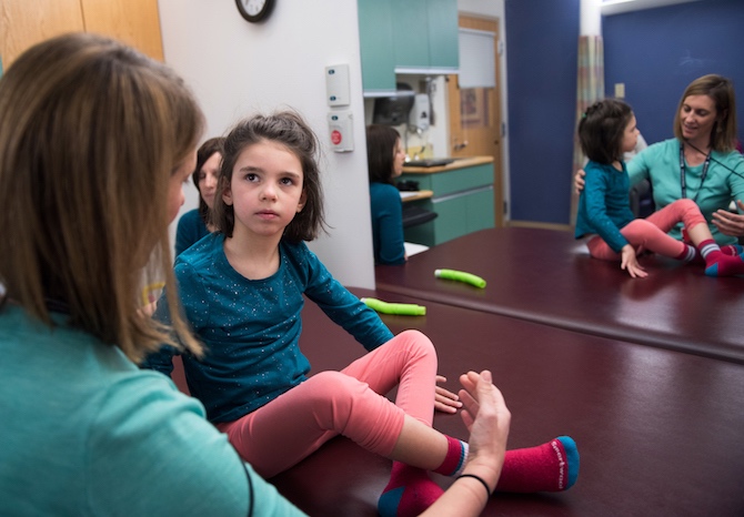 Girl with Batten disease has a physical therapy evaluation