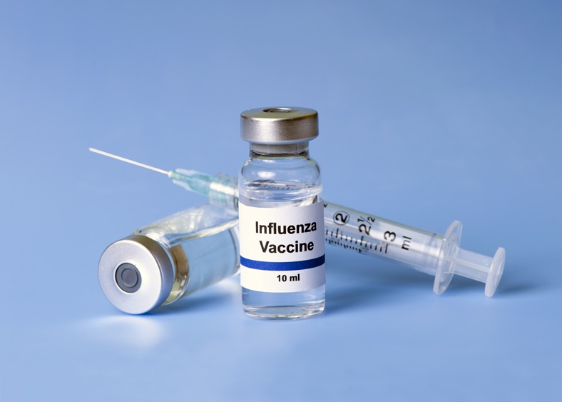Photo of flu vaccine vial and needle