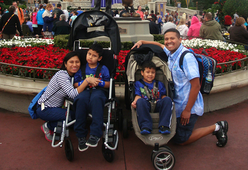 The Rojases, with their two sons who have ALD, on a trip to Disney World. 
