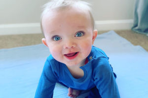 smiling little boy with reflux