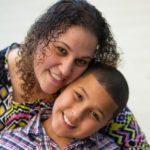 Joel Torres, who has asthma, poses with his mom.