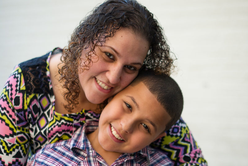 Joel Torres, who has asthma, poses with his mom.