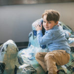 boy with tracheobronchomalacia plays at the hospital