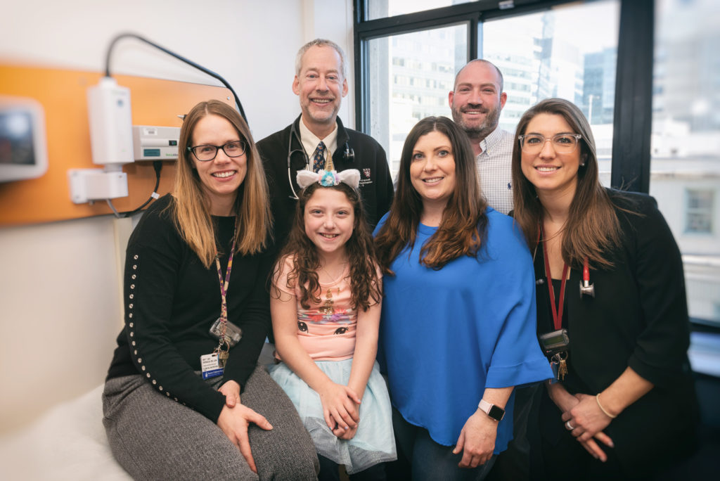 girl on teduglutide with her clinical team