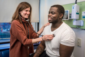 Manny, who has sickle cell disease, at a visit with Dr. Esrick