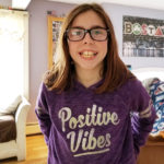 12-year-old girl with cdh smiles at camera