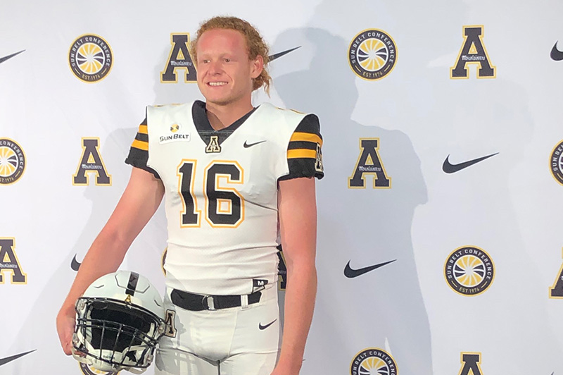 Ryker, who had surgery for osteochondritis dissecans, poses in his new Appalachian State uniform.