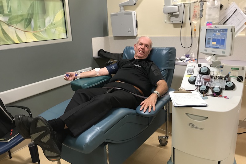 Bob Watson sits in blood donor bed