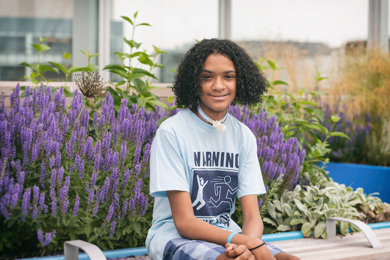 chase sits in a garden after a jejunal interposition