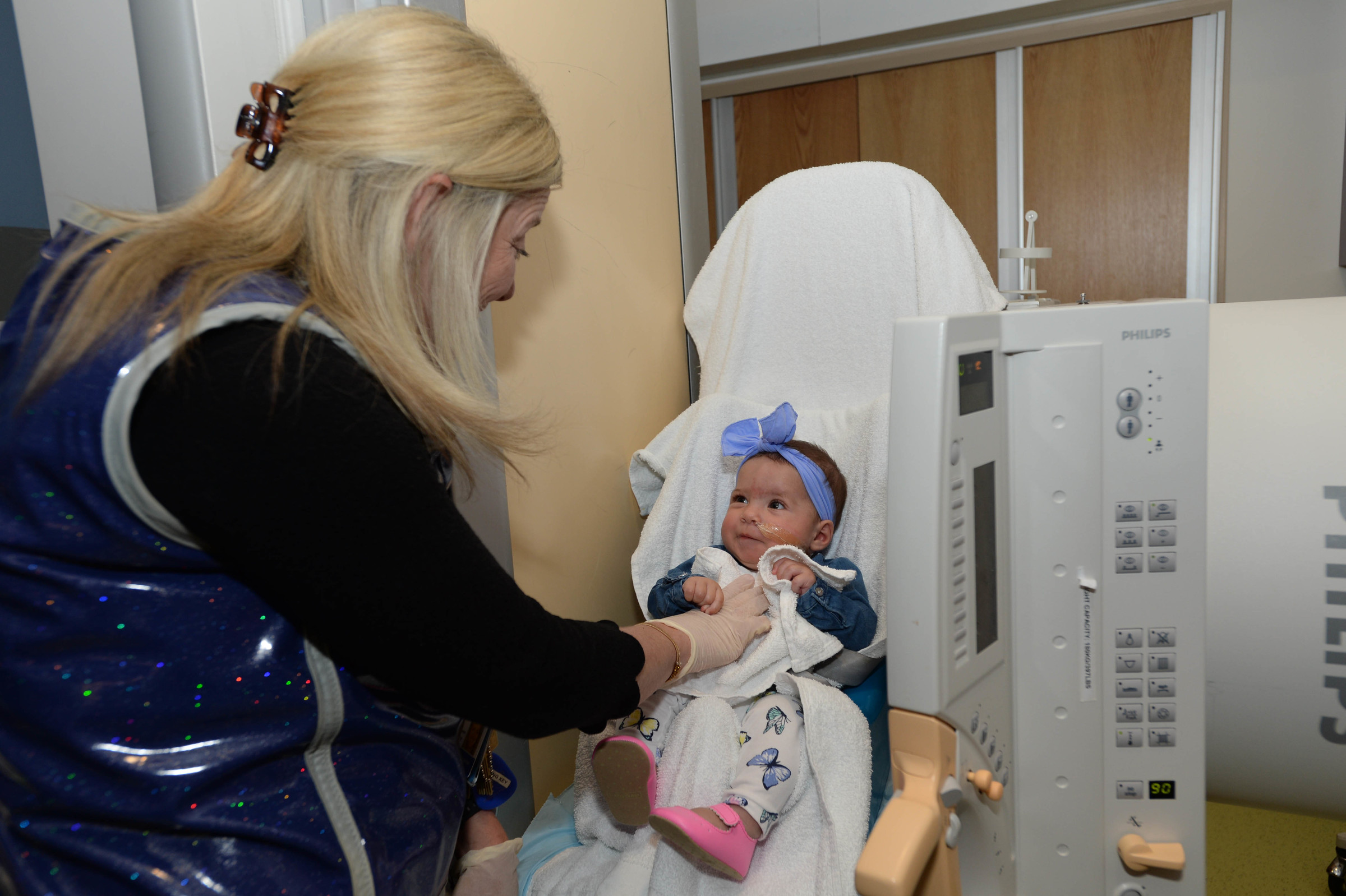 kara larson gets mia ready for her swallow study