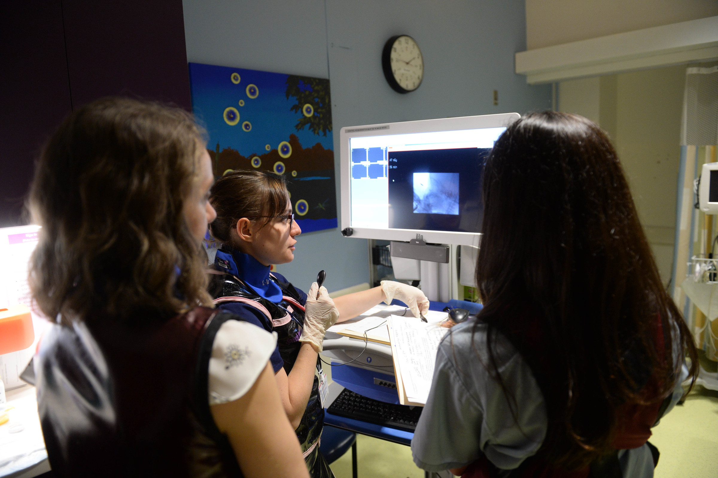 clinicians watch the mia's swallow study on screen