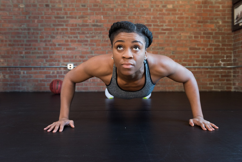 Female athlete in plank pose