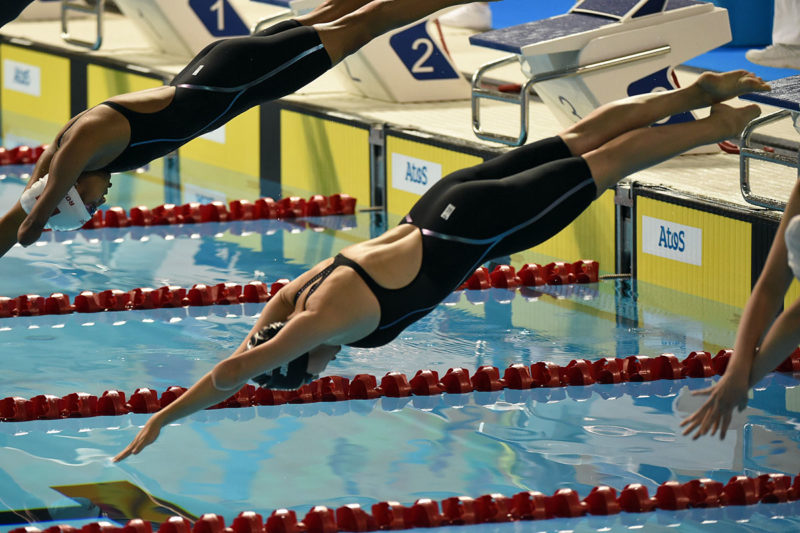 Anna dives off the block at the Paralympic Games.