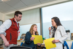 Doctors from Dana Farber discuss a case.