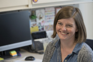 Meghan, who is a project manager for clinical research studies, sits at her computer