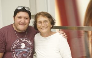 Joey, who has DiGeorge syndrome, poses with his mom