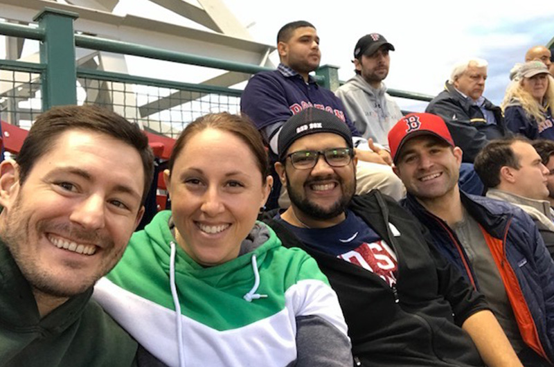 Dr. Carrie Heincelman, an orthopedic oncologist, at a Red Sox game with friends. 