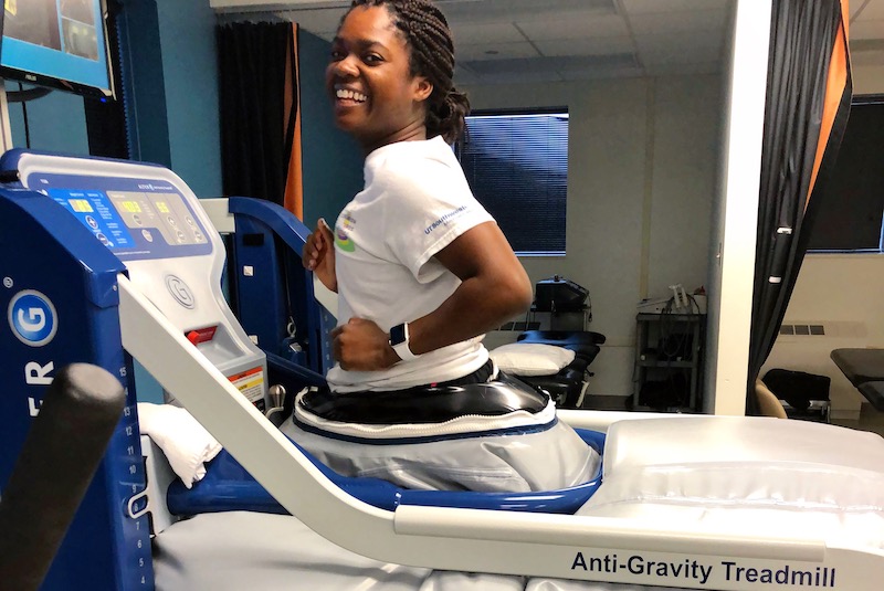 Louise, who had surgery for hip dysplasia, running on an anti-gravity treadmill during recovery.