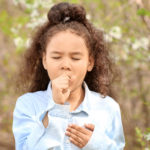 African American girl having asthma attack - AsthmaNet