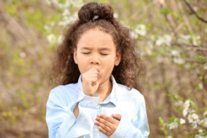 African American girl having asthma attack - AsthmaNet