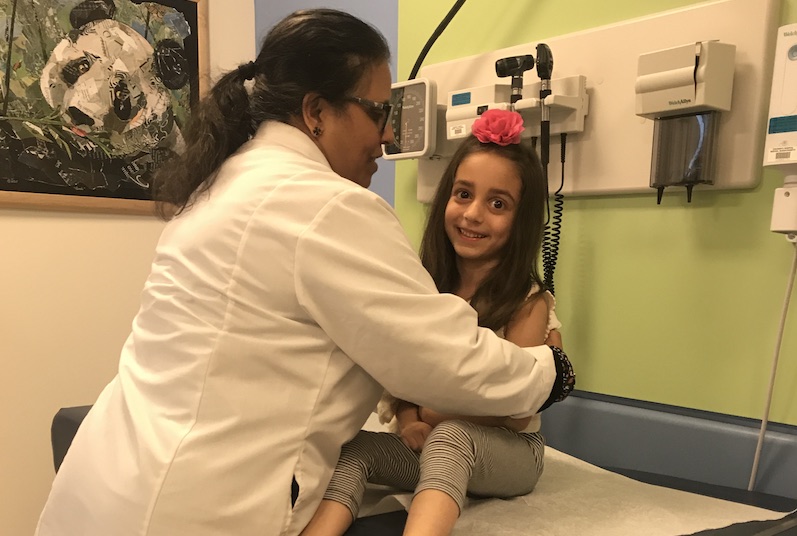 Mary, who has Dravet syndrome, gets a checkup from her doctor.