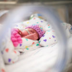Premature baby sleeps in NICU