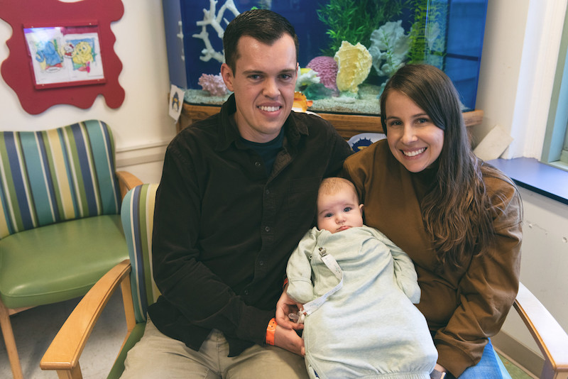 stetson, who has bladder exstrophy, is held by his parents
