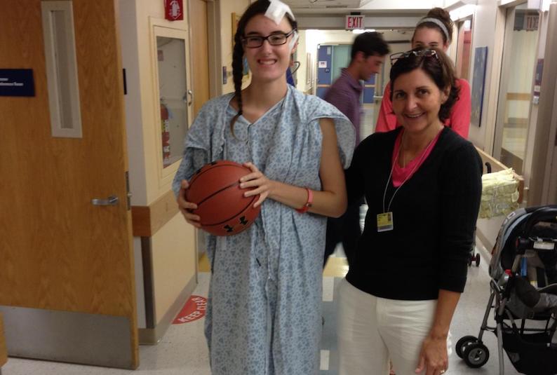 Kristen walks the floor in the hospital after her epilepsy surgery