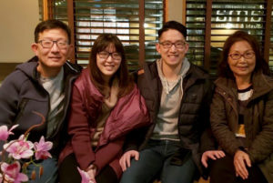 Elizabeth, who has moyamoya, poses with her family