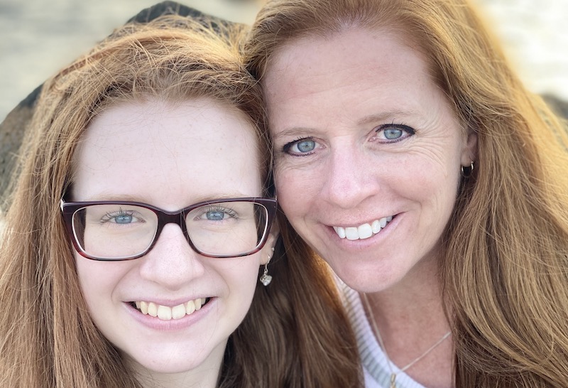 Ava, who has a heart condition, poses for a closeup photo with her mom