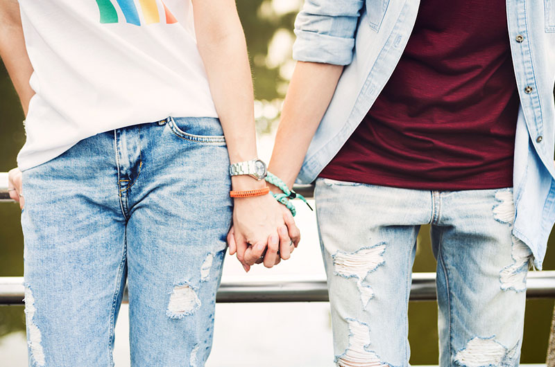 teens holding hands