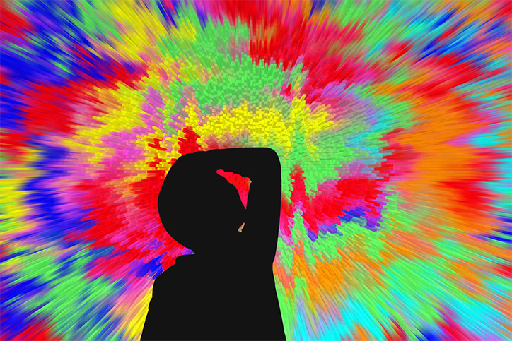 graphic of child holding head in front of neon color splash