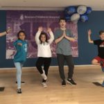 Six children try yoga poses