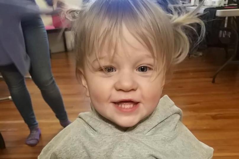 Finley, who had surgery for a cavernous malformation, smiles