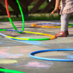 children playing with hula hoops to denote vascular rings