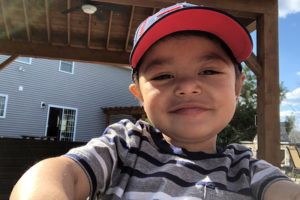 keith wearing a red hat