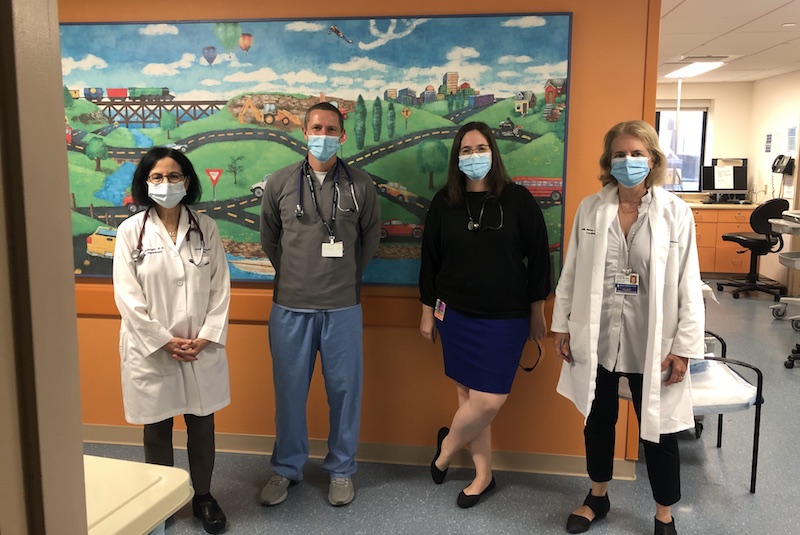 Members of the cardiac MIS-C team pose in the Heart Center