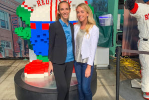 Crista and Dr. Stegmaier pose in front of Red Sox mascot