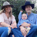 Matt, who has hemophilia A, sits with his wife, Ashley, and son, Daxton. They are wearing cowboy hats and sitting on blue chairs