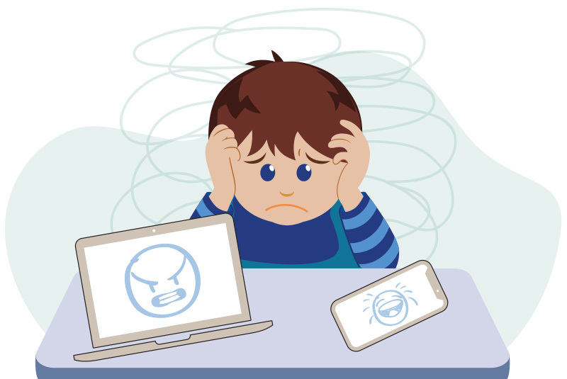 Cartoon of boy looking upset in front of computer and cell phone with mean emojis