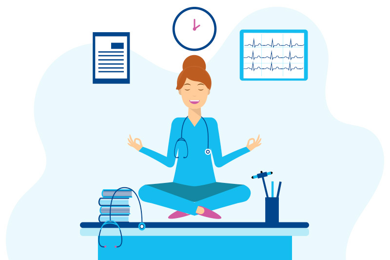 During COVID-19, a clinician sits on her desk meditating to manage stress.