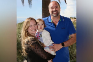 hadley, who had a stroke, with her parents