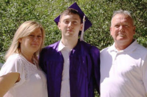 The Harris family at jack Jr.'s graduation. Both Jack Jr. and his father have congenital heart disease.