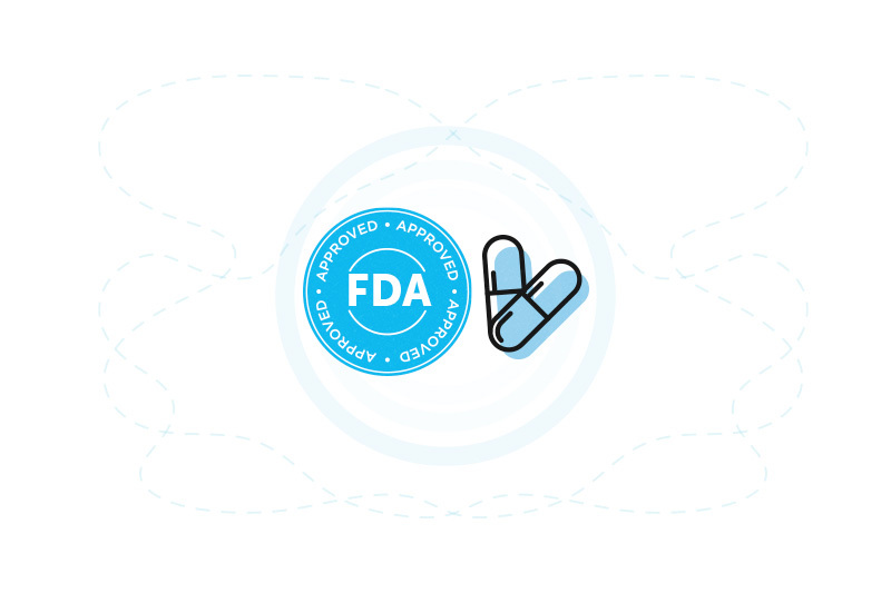 illustration of drug capsules next to FDA approval seal