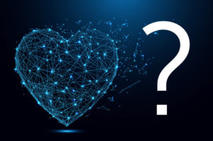An image of a heart made of light points with a question mark to the right of it