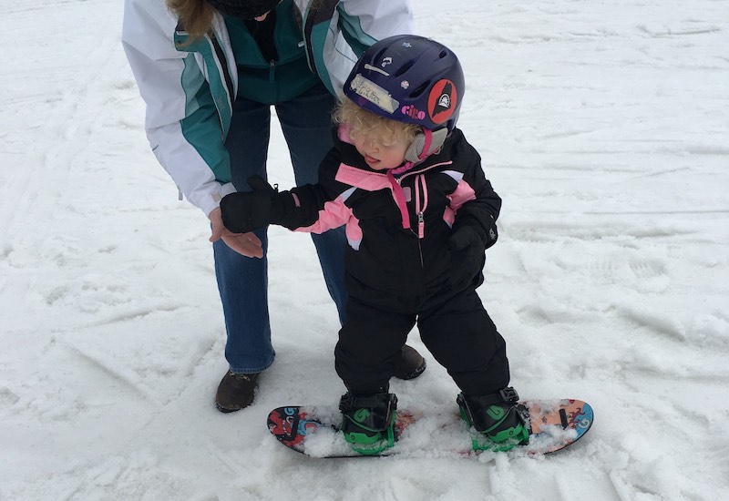 Maisie, who has Apert syndrome, learns to snowboard.