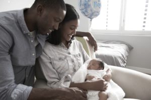 A couple with newborn baby